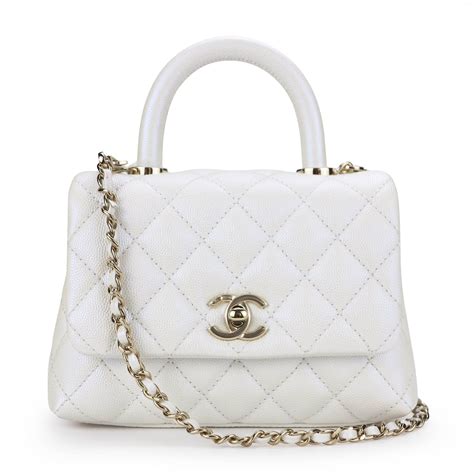 chanel extra mini coco handle bag.